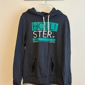 Hollister Women's Dark Gray Hoodie with Teal Logo